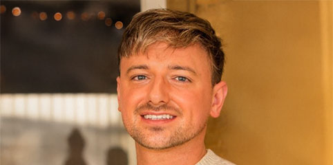 Jamie is a young man with a stubble beard